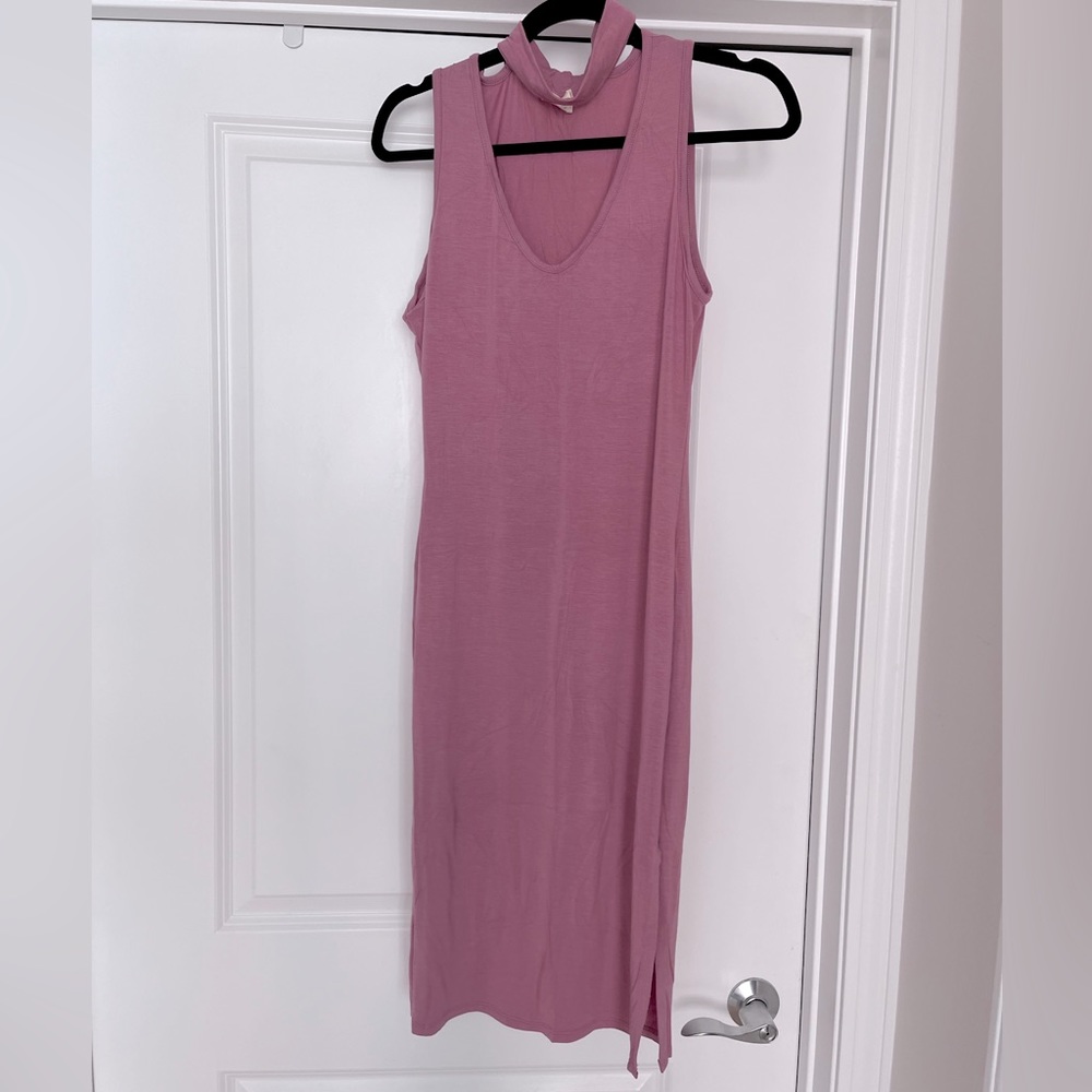 NWOT. Midi dress. Light jersey fabric. Brand new. Never worn.